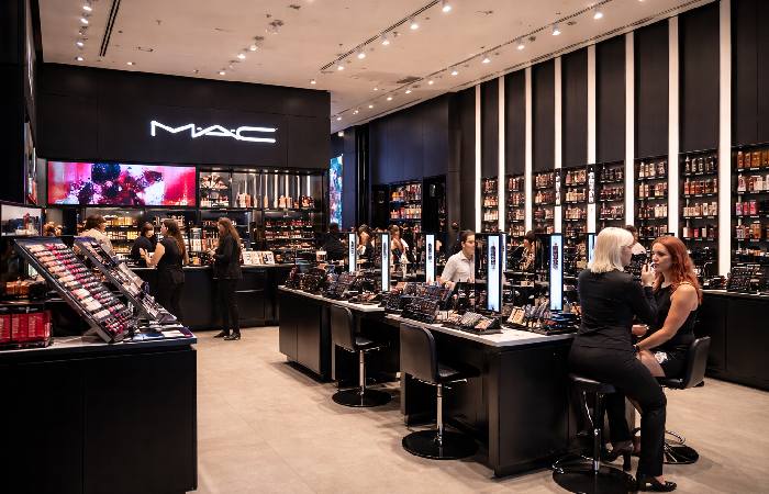 Interior of MAC Cosmetics flagship store in Las Vegas with makeup stations and artist consultations