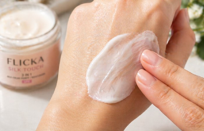 Cream being blended on skin showing smooth luminous finish